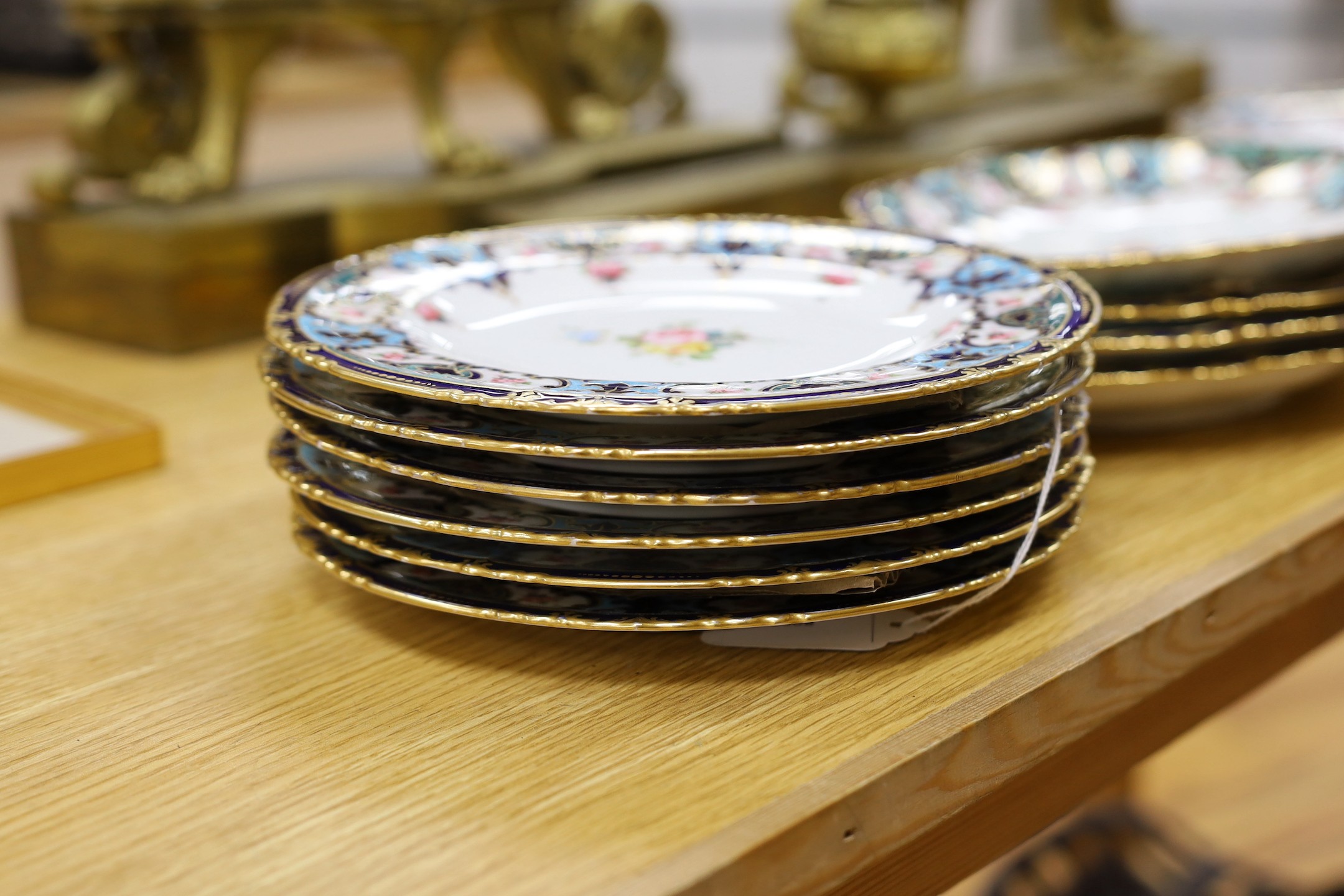 A Royal Crown Derby fifteen piece porcelain floral and gilt dessert service, c.1900